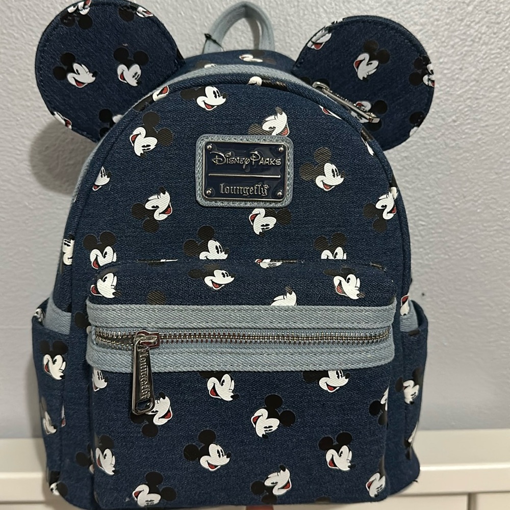 Disney Loungefly Mickey jean. New never used with matching card wallet